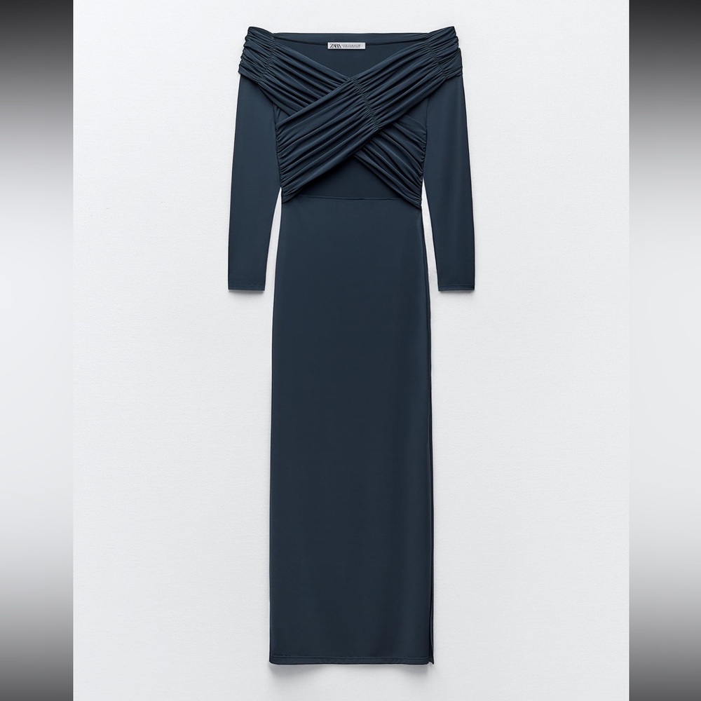 Draped fitted dress.